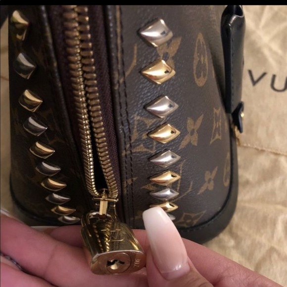 Louis Vuitton Alma purse with spikes - Picture 3 of 7